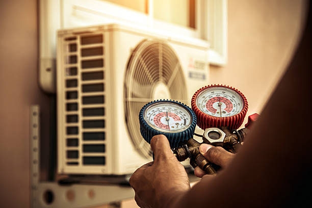Professional Heat Pump Repair technician working in Easton, TX